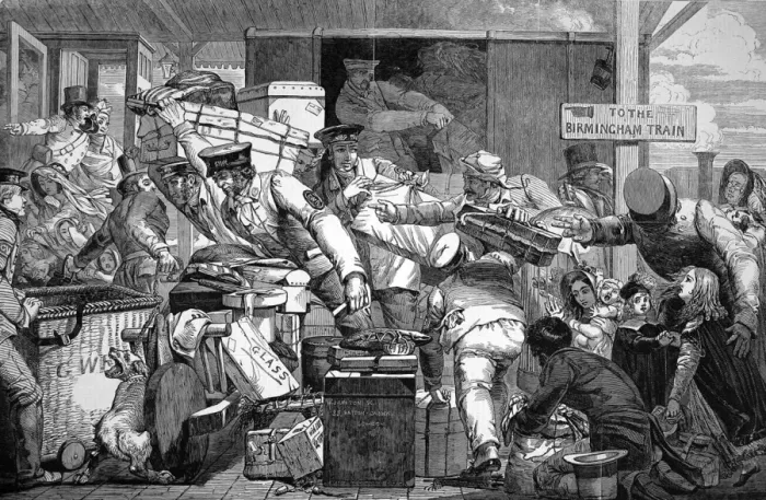 Framed Print : Luggage being moved onto a narrow train Framed Print : Luggage being moved onto a narrow train