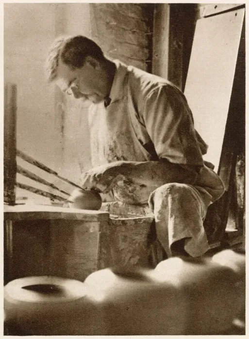 Framed Print : A man forming articles upon the potters wheel: a thrower. Date: 1913 Framed Print : A man forming articles upon the potters wheel: a thrower. Date: 1913