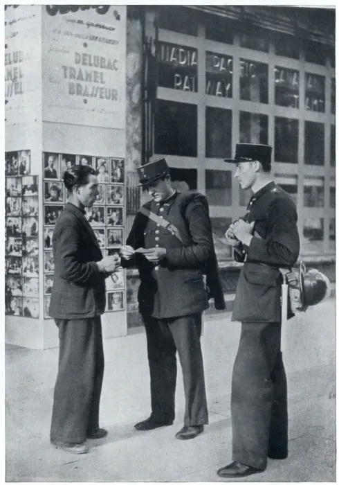 Framed Print : Man shows identity papers to gendarmes, September 1939