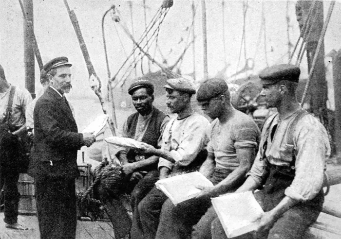 Framed Print : Mission to Seamen Chaplain distributing Papers, 1906 Framed Print : Mission to Seamen Chaplain distributing Papers, 1906