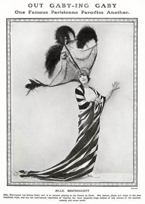 Framed Print : Mistinguett, performing at the Casino de Paris, parodying fellow Parisian performer Gaby Deslys by wearing enormous, flamboyant hat. Date: 1919 Framed Print : Mistinguett, performing at the Casino de Paris, parodying fellow Parisian performer Gaby Deslys by wearing enormous, flamboyant hat. Date: 1919
