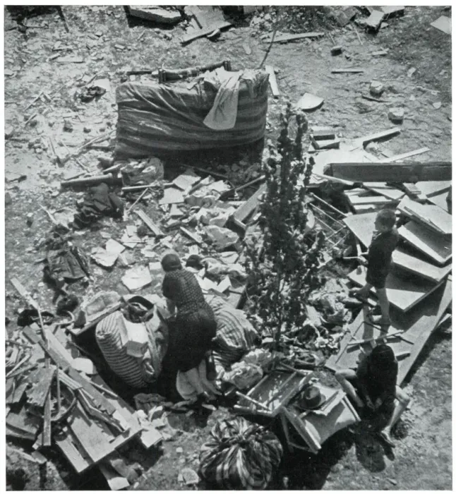 Framed Print : Mother searching for her belongings in debris 1939