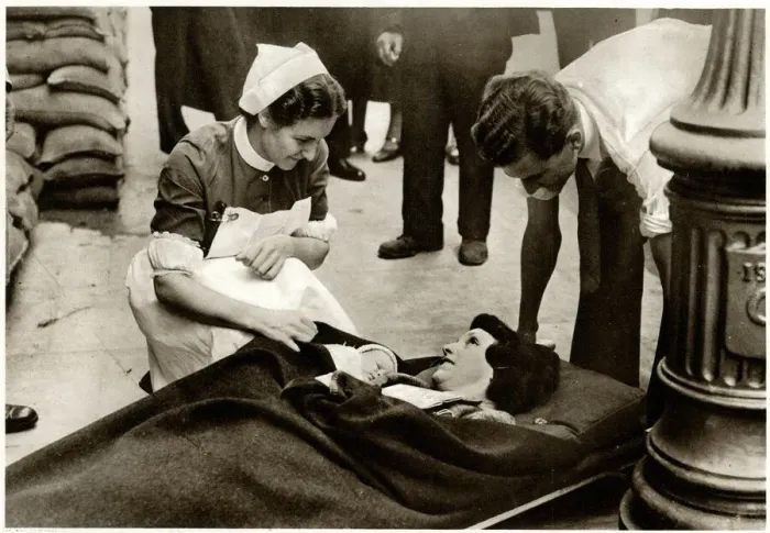 Framed Print : New mother evacuated from hospital 1939