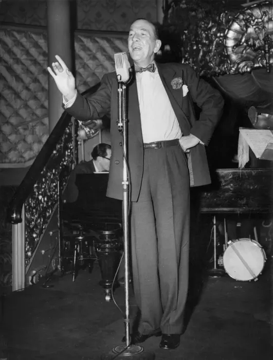 Framed Print : Noel Coward in cabaret at the Cafe de Paris