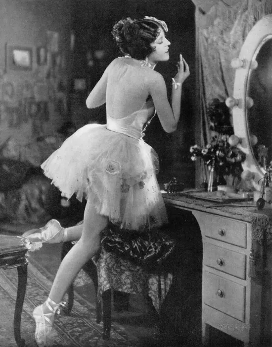 Framed Print : Olive Borden applies lipstick in the mirror Framed Print : Olive Borden applies lipstick in the mirror