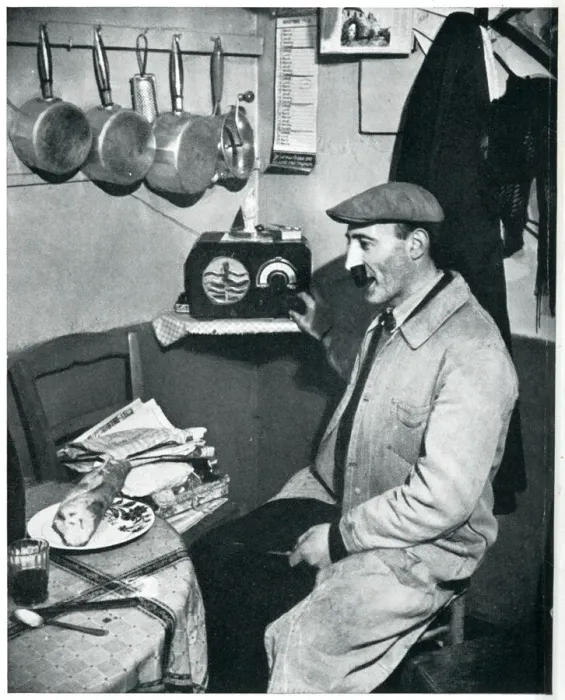 Framed Print : Outbreak of WWII Parisian greengrocer listens to the news