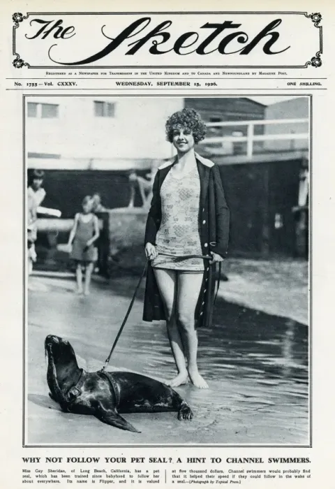 Framed Print : Pet seal with owner Gay Sheridan 1926