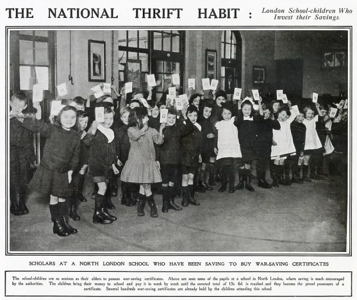 Framed Print : Photograph of children in a North London school holding up their National war-savings certificates. The children bring their money in week by week until the coveted total of 15s Date: 1917 Framed Print : Photograph of children in a North London school holding up their National war-savings certificates. The children bring their money in week by week until the coveted total of 15s Date: 1917