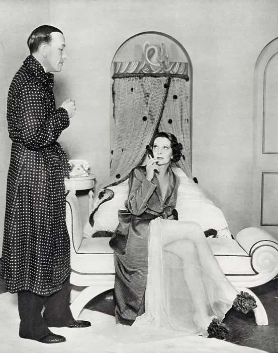 Framed Print : Photograph showing Noel Coward (1899-1973) and Gertrude Lawrence (1898-1952) starring in Coward's repertory Tonight at Seven Thirty, which included the piece Shadow Play, Manchester, 1935. Date: 1935 Framed Print : Photograph showing Noel Coward (1899-1973) and Gertrude Lawrence (1898-1952) starring in Coward's repertory Tonight at Seven Thirty, which included the piece Shadow Play, Manchester, 1935. Date: 1935