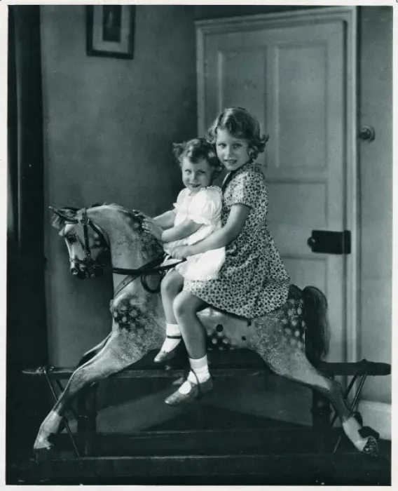 Framed Print : Princesses Elizabeth and Margaret on a rocking horse
