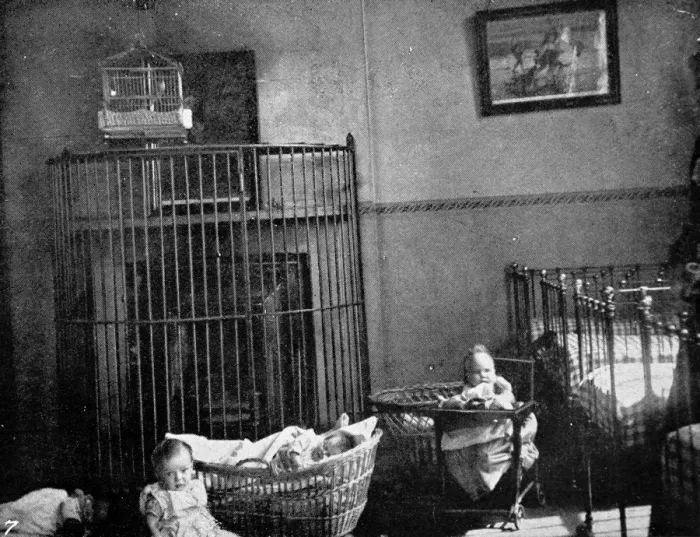 Framed Print : Prison babies in chairs and cots in the day nursery Framed Print : Prison babies in chairs and cots in the day nursery