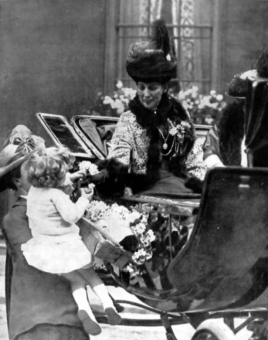 Framed Print : Queen Alexandra receiving a rose from a child, London, 1925 Framed Print : Queen Alexandra receiving a rose from a child, London, 1925