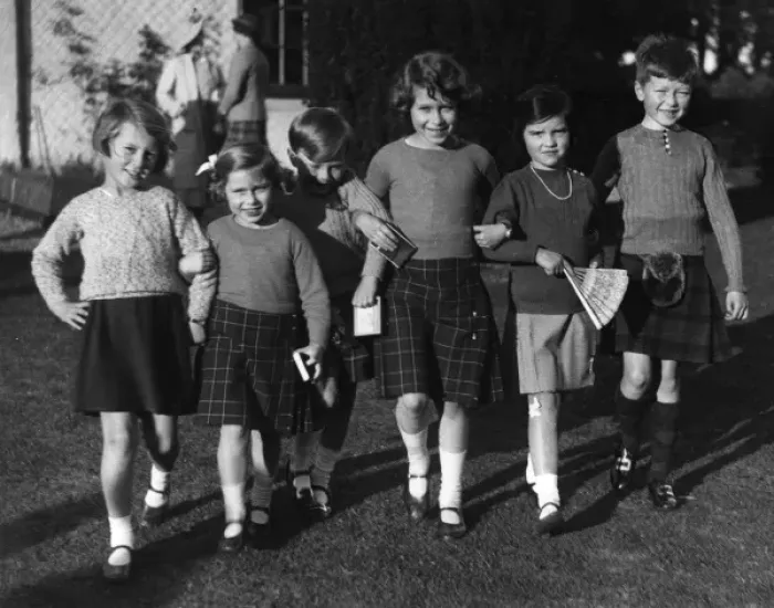 Framed Print : Queen Elizabeth II attends a birthday party as a girl Framed Print : Queen Elizabeth II attends a birthday party as a girl