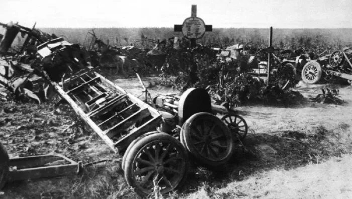 Framed Print : The remains off a German motor-transport convoy grouped round soldiers graves