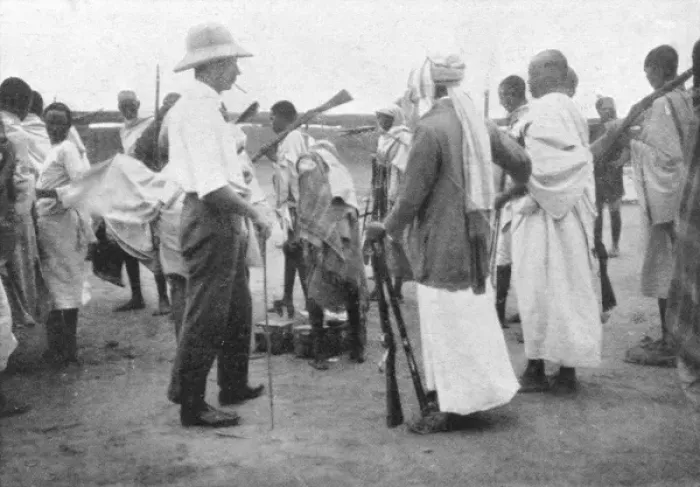 Framed Print : Richard Corfield distributing arms at Burao Fort