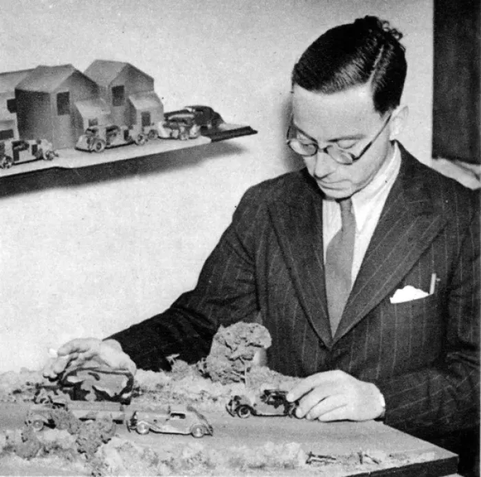 Framed Print : Richard Levin Working on Camouflage
