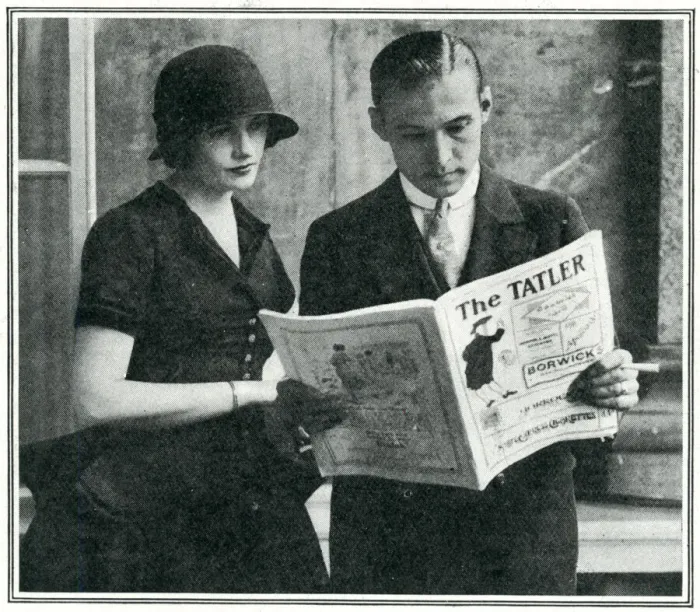 Framed Print : Rudolph Valentino reading The Tatler