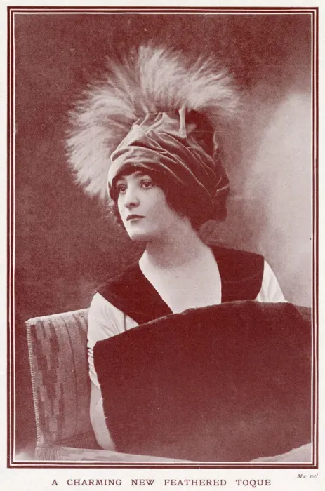 Framed Print : Woman wearing a fashionable velvettoque hat with plumes of feathers. Date: 1911 Framed Print : Woman wearing a fashionable velvettoque hat with plumes of feathers. Date: 1911