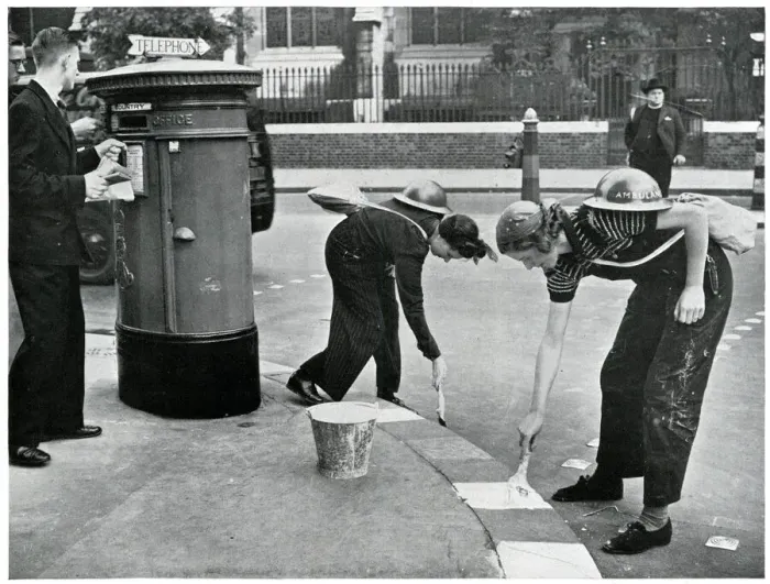 Framed Print : Women painting kerbside for blackouts, September 1939