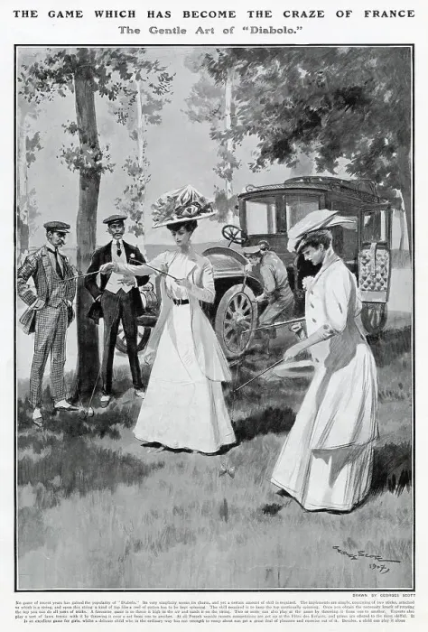 Framed Print : Two women playing Diabolo in France while a mechanic fixes their car. Date: 1907 Framed Print : Two women playing Diabolo in France while a mechanic fixes their car. Date: 1907
