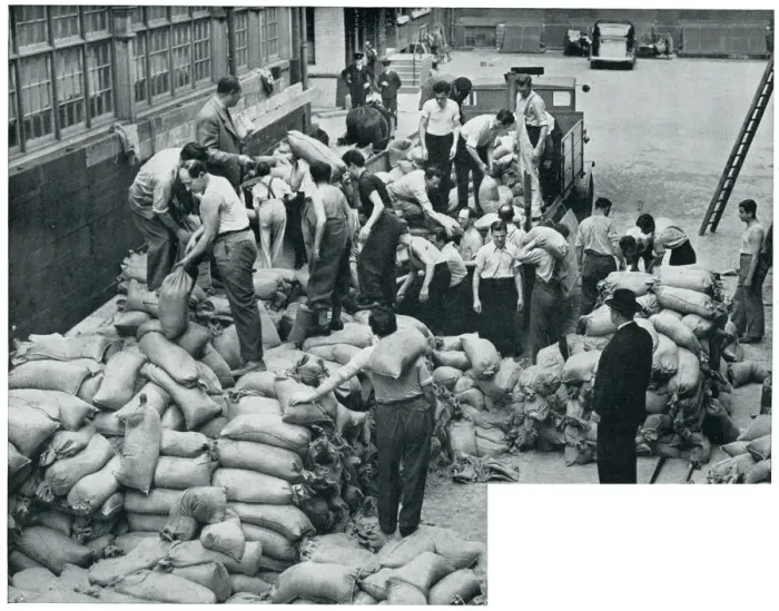 Framed Print : WWII Jewish refugees helping with sandbags Framed Print : WWII Jewish refugees helping with sandbags