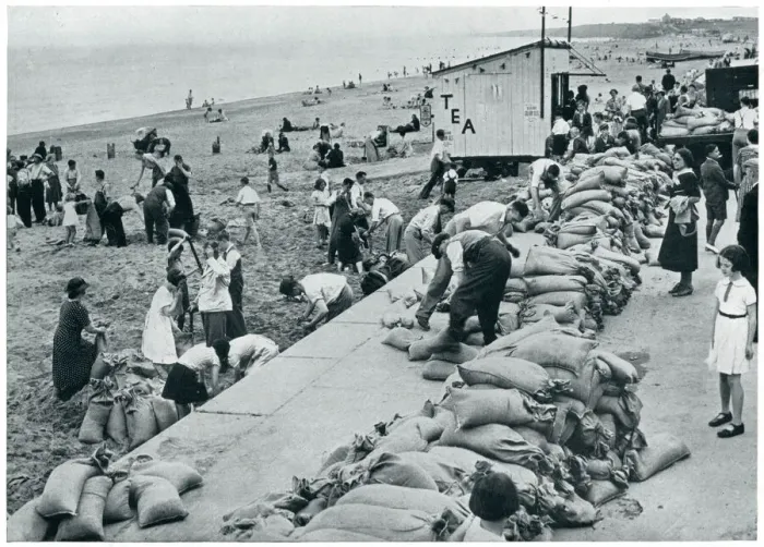 Framed Print : WWII September 1939 Holiday makers filling sandbags