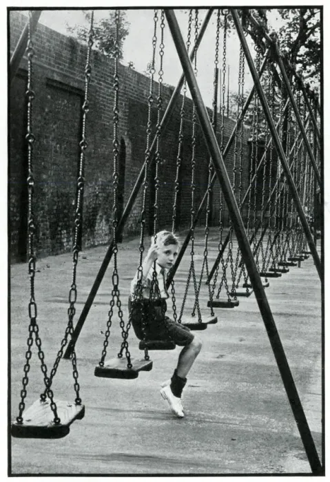 Framed Print : Young boy alone on a playground swing 1939 Framed Print : Young boy alone on a playground swing 1939
