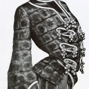 A women wearing a seasonable jacket for winter, with moleskin trimmed with braid