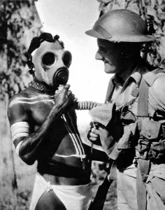 Northern Prints: Aborigine trying on a Gas Mask, Australia, Second World War
