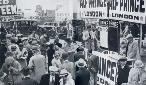 Sport Prints: Alf Prince, bookmaker - stand at Epsom racecourse. Date: 1937