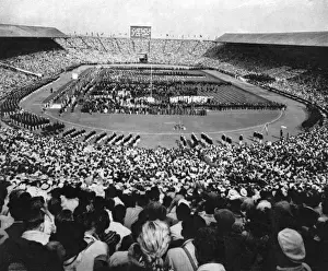 Xivth Prints: American Olympic athletes march round Wembley Stadium, 1948