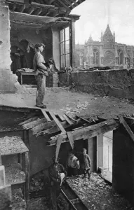 Bomb Prints: Bomb damage to a house next to Reims Cathedral