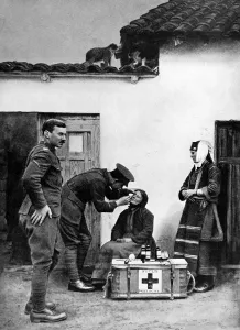 2004 Prints: A British doctor attending to a Macedonian villager