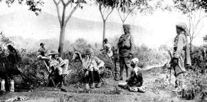 December Prints: British Officers interrogating a prisoner, East Africa, 1916