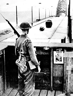 Route Prints: British Sentry keeping watch on Nijmegen Bridge; Second Worl