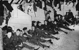 Resting Prints: British soldiers in stables billet, France, 1939