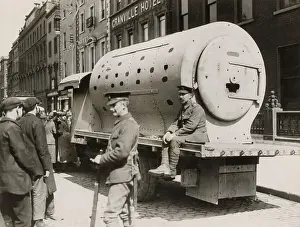 Feb16 Prints: British troops by an improvised armoured car made of locomotive engine smoke-boxes