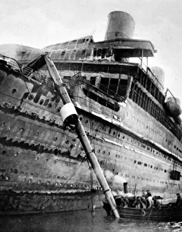 Approaching Prints: Burnt out liner L Atlantique, successfully brought into port