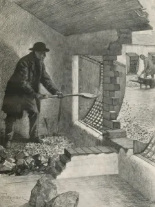 Rocks Prints: A casual worker shovelling stones from his cell