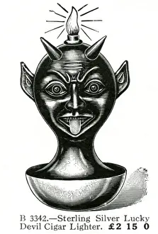 Cigarette Prints: Christmas present - Lucky silver devil cigar lighter 1909