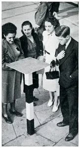 Table Prints: Civilians crowding around a gas-detector table, Sept 1939
