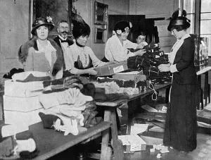 Packing Prints: Countess Zia and Nada Torby packing mittens for troops, WW1