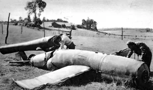 Examining Prints: Crashed V-1 Flying Bomb; Second World War, 1944