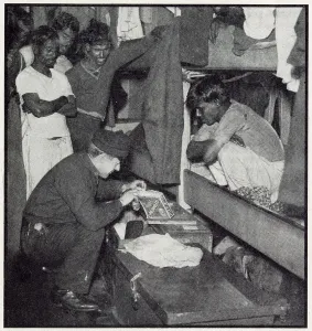 Ship Prints: A customs official from the flying squad searches the quarters of a Lascar crew of a sugar freighter to check no
