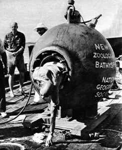 May Prints: Dr. Beebe climbing out of his bathysphere, August 1934