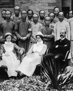 Mission Prints: Dr. W. A. Thatchell pictured with blind Chinese boys, Chinese Revolution