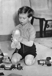 Child Hood Prints: Duke of Kent as a boy with barrage balloon toy
