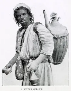 Cairo Prints: Egyptian man selling water from a clay jug on his back in Cairo, Egypt