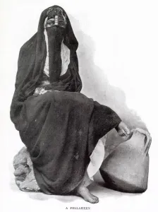 Cairo Prints: Egyptian woman from Cairo wearing traditional clothing. Date: 1902