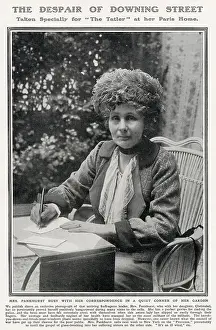Paris Prints: Emmeline Pankhurst pictured working on correspondence at her home in Paris in a photograph taken exclusively for The